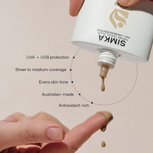 Load image into Gallery viewer, SIMKA Tinted Facial Fluid SPF 50 - Alexia Makeup • Hair • Beauty
